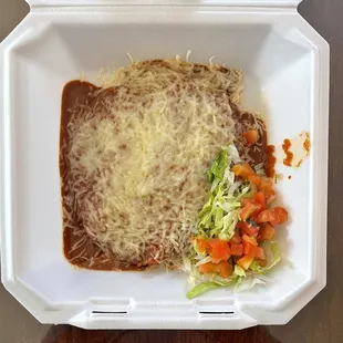 a meal in a styrofoam container