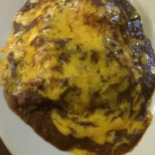 3 beef enchiladas with fried eggs