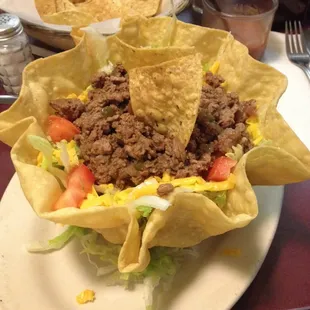 Beef Taco Salad is all lettuce with a heaping scoop of beef; no beans in the bottom (I was expecting beans).