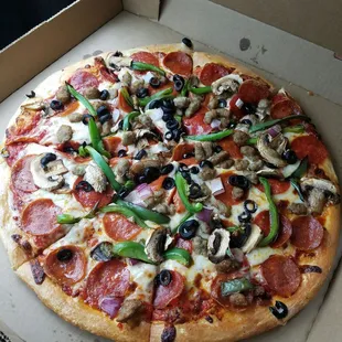 Build your own pizza Supreme. Pepperoni, black olives, mushrooms, onions, green peppers, and Italian sausage! ~Delicious