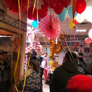 people walking through the store