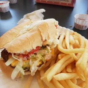 1/2 cheeseburger sub, missing a few bites. Lots of fries. Love this sub!