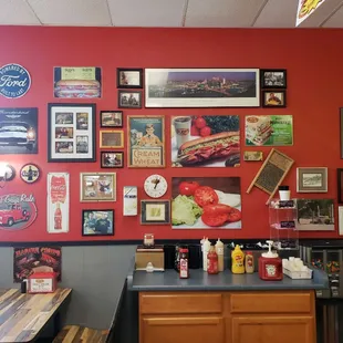 a wall full of pictures