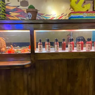 Hot sauce display. I am not sure why need more than one but, there is at least 2.