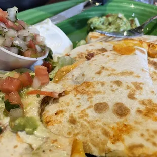 Beef and cheese quesadilla. Tasty with a bit of each layered on top.