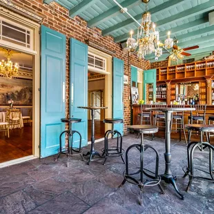 The Mezzanine Bar features a mahogany cocktail bar and exposed brick.