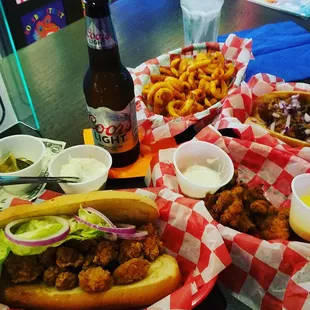 Shrimp poboy and hot link chili dog