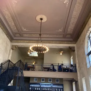 Cool space with gargoyles drinking coffee in the architecture
