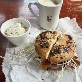 CBD Sandwich on onion bagel with potato salad
