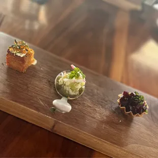 Amuse Bouche: caviar topped potato cake, crab salad, best and goat cheese tart! The best beginning...
