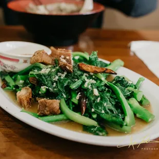 Crispy pork belly with Chinese broccoli