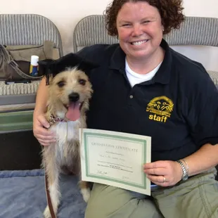 Peggy and her pup at graduation
