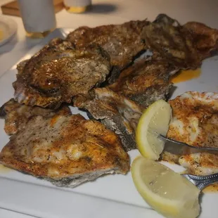 a plate of grilled fish