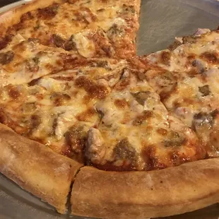 Thick crust cheese and sausage.