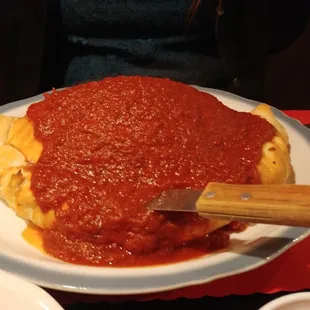 a plate of spaghetti and sauce