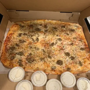 Grandpas pizza with ranch on the side