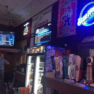 a man standing at the bar