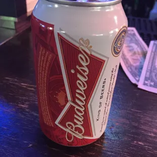 a can of beer on a table