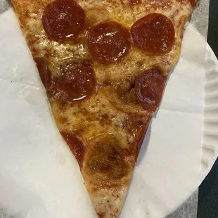 a slice of pepperoni pizza