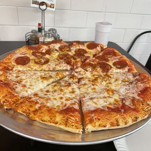 Medium pizza with cheese and pepperoni!  Made fresh when we ordered.