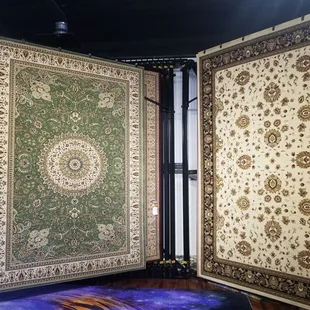 a room with a large area rug