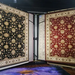 a pair of rugs on display