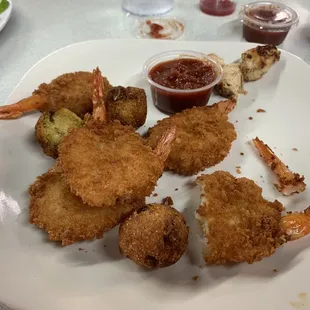 Shrimp was cooked perfectly and hush puppies had great flavoring.