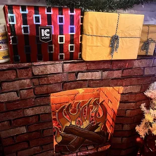 a brick fireplace with presents on it