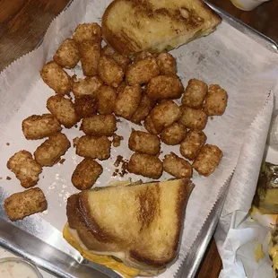 Grilled 3 Cheese Sandwich with pickles and tots