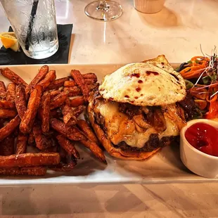 Lamb Burger with sweet potato fries and salad