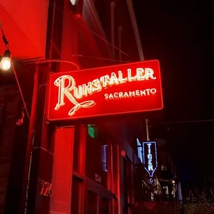 a neon sign on a building