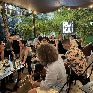 a group of people sitting at a table