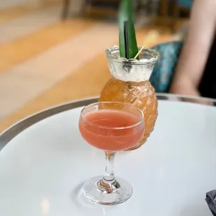 a cocktail in a glass on a table