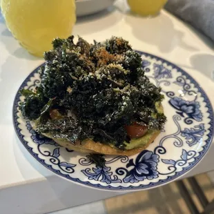 Vegan guacamole tostada (kale on top)