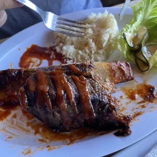 Dino rib with Korean sauce drizzle