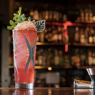 a close up of a drink on a bar