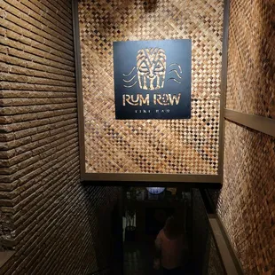 the entrance to rum row tiki