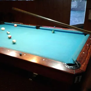 a pool table in a room