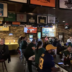 a large group of people sitting at tables