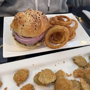 A terrific burger - The Real McCoy, onion rings and Fried Pickle Chips. Yum!