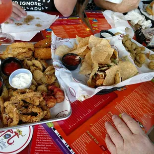 a table full of food and drinks