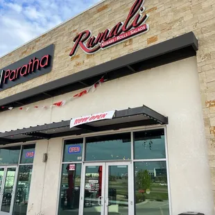 the front entrance of a restaurant