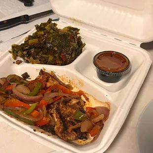 Classic Jamaican Jerk Grilled Chicken with peppers and onions.
