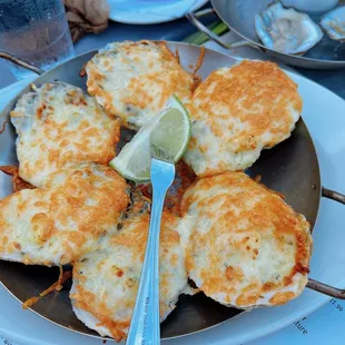 a plate of crab cakes