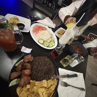 a table full of mexican food