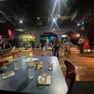 people dancing in a rumba room