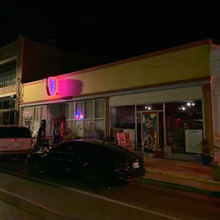cars parked in front of the store