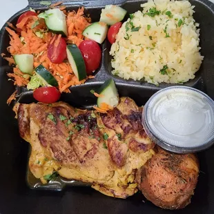 a meal of chicken, rice and vegetables