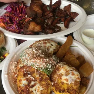 three plates of food on a table