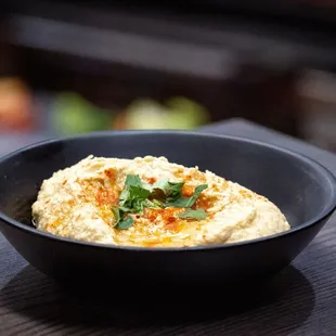 A fresh take on a classic dip, featuring eggplant, tomato, red and green pepper, olive oil, and garlic. Smooth and savory, it pairs well.
